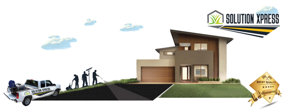 solution xpress spraying a driveway